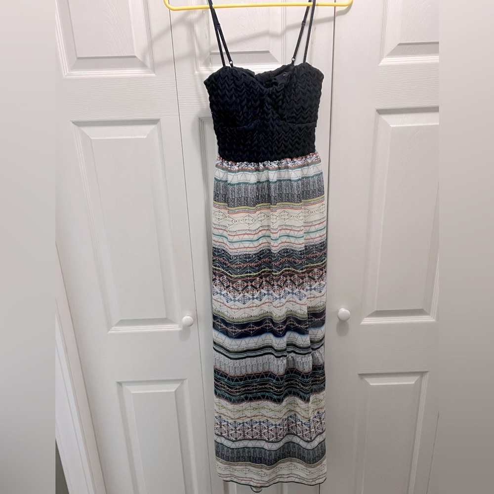 Small Trixxi flowy beach dress with open back.